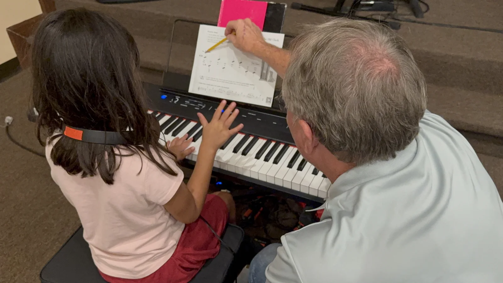Student receiving personal keyboard instruction