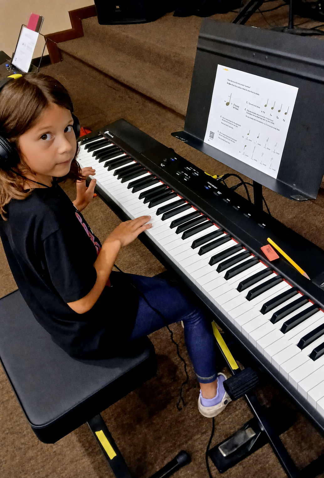Spark Academy student learning at a keyboard